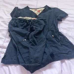 Koi navy scrub set top is medium pants are size small